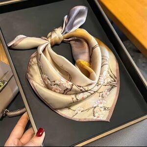 Elegant Floral Silk Scarf 
100 percent silk 53x53 measurement
NWOT